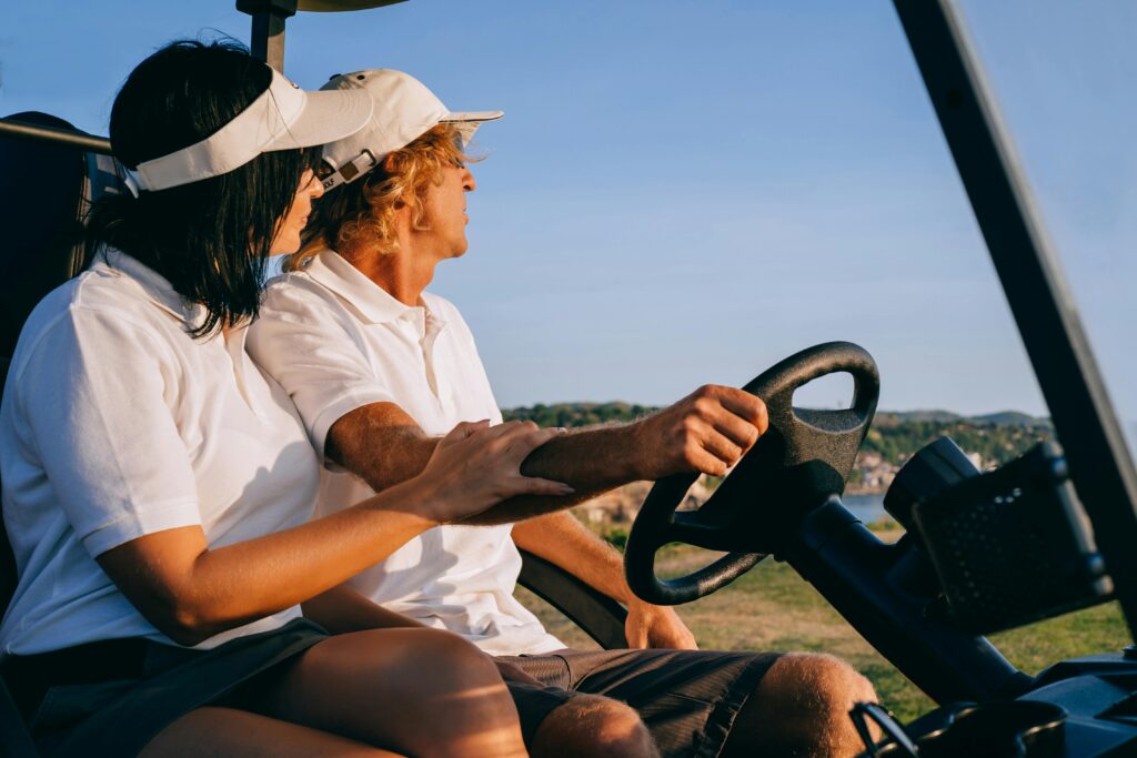 Watching a golf ball from the golf cart.